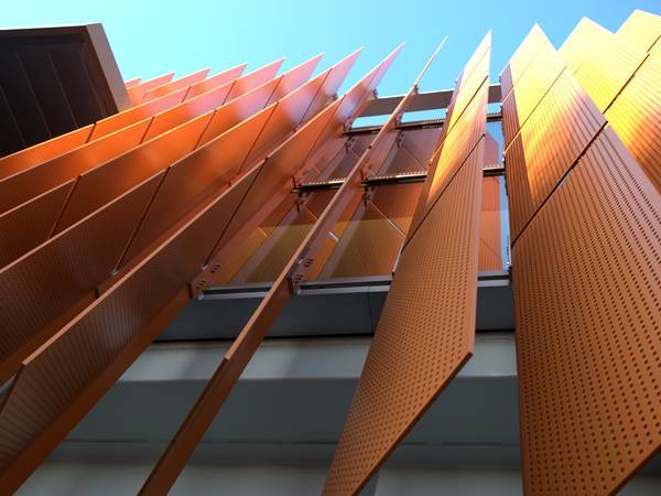 Blinds shade panels consist of perforated copper sheets.