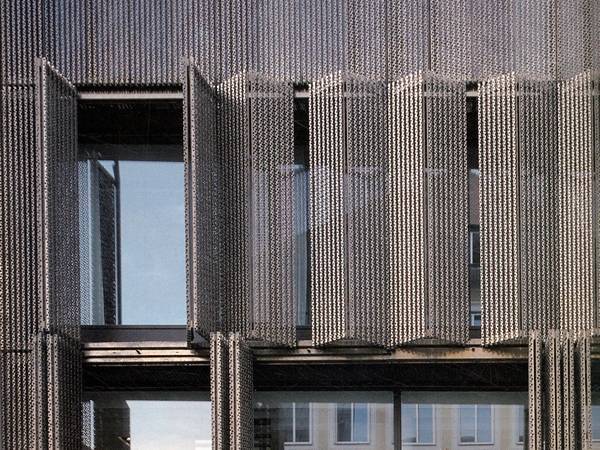Corrugated perforated panels are installed as folding shutter.