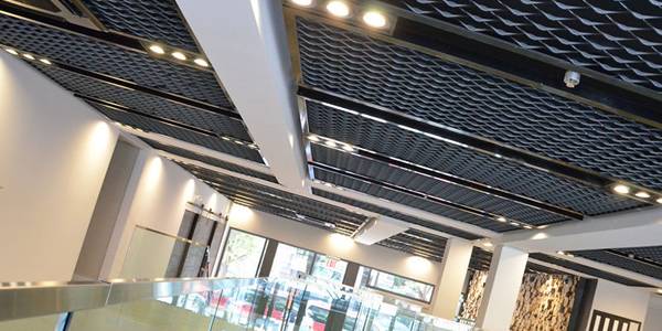 Expanded metal panels are installed for hall ceiling design.