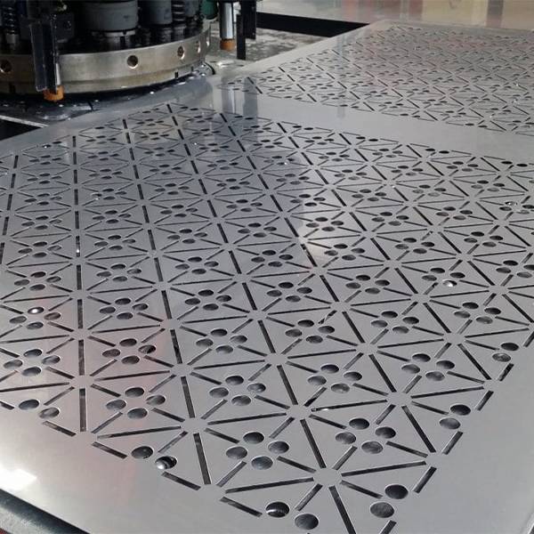 CNC punching machine and press machine are used to produce perforated sheets.
