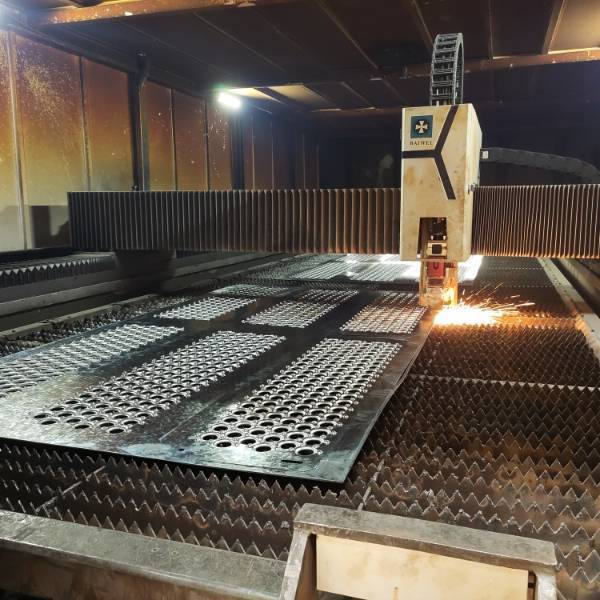 A Laser cutting machine is producing perf-O safety grating.