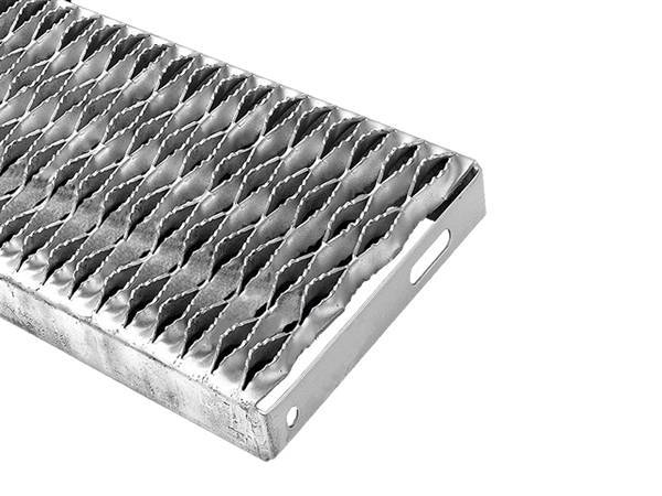 There is a grip strut safety grating stair tread with diamond openings.