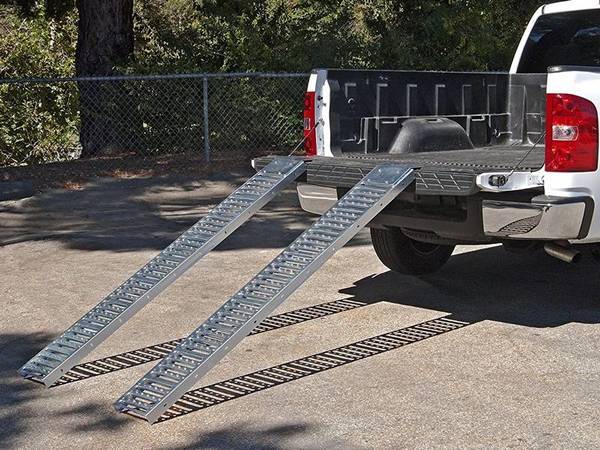 The car ramps for convenient loading is made of interlocking safety gratings.