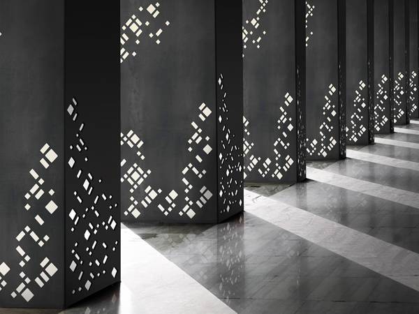 The hall pillars are decorated with laser cutting perforated metal panels.