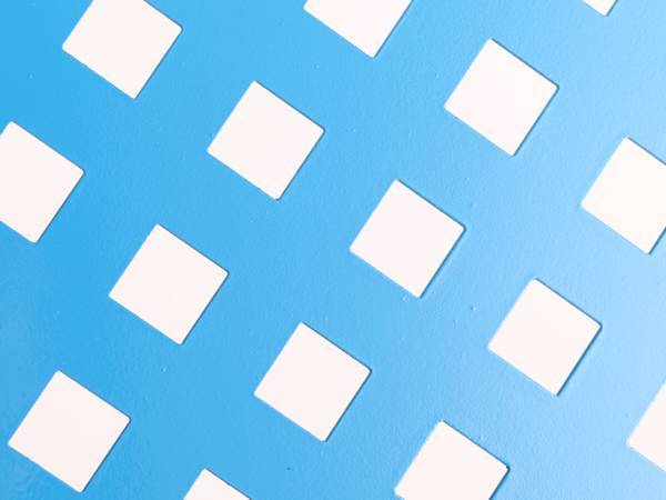 Blue perforated aluminum sheet with square holes.