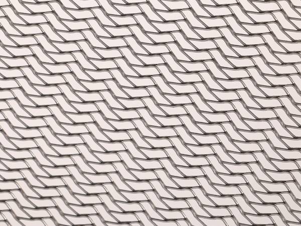 Steel expanded metal sheet with chantilly style opening.