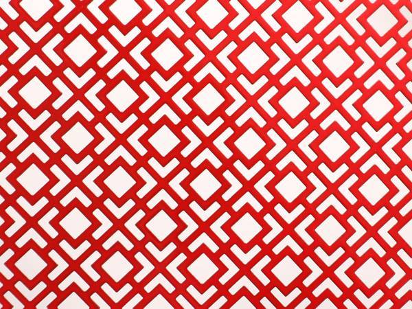 Red perforated steel sheet with window lattice pattern.