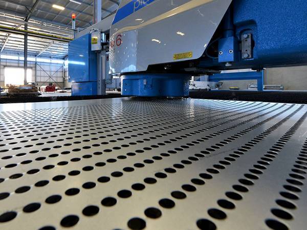 Round hole perforated sheet produced by CNC punching process.
