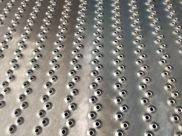A new pattern of safety grating with stagger openings on the plates.