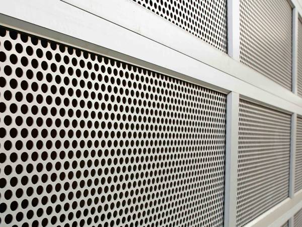 Perforated galvanized steel sheets are installed for security screen.