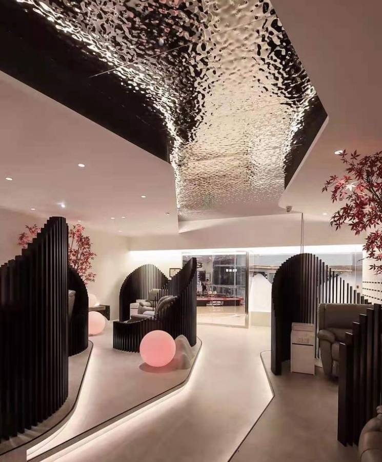 Ceiling of the hotel lounge area decorated with water ripple sheets