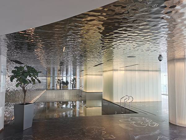 Installation of water ripple sheets on the ceiling of indoor swimming pool