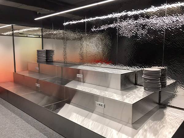 Water ripple sheets used as backdrop in internal space